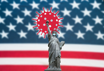 Obraz premium La statue de la liberté masquée pour le coronavirus