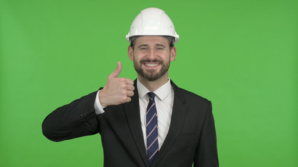 The Young Happy Engineer Showing Thumbs Up against Chroma Key
