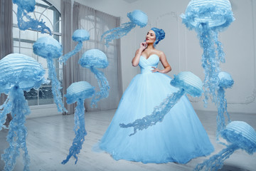 Beautiful female with blue hair and jellyfish © Alexei