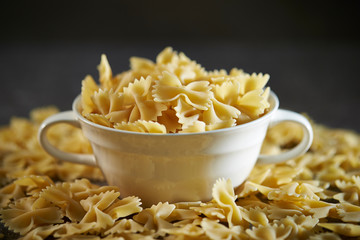 Dried farfalle pasta in cup