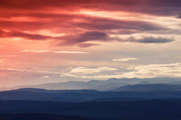 colorful sunset sky with clouds and sunlight