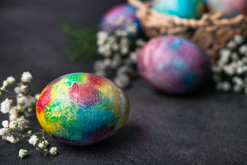 Easter holiday concept with colored space egg