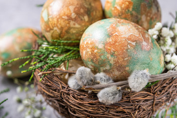 Obraz na płótnie Canvas Marble color decoration Easter eggs with flowers