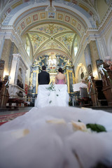 Obraz na płótnie Canvas Wedding ceremony couple in the church Beautiful wedding church decoration