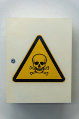 poison cabinet with warn sign (skill and crossbones)