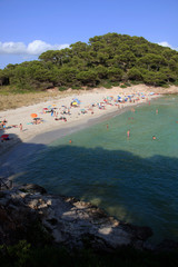 Fototapeta na wymiar Cala Trebaluger, Menorca / Spain - June 22, 2016: Cala Trebaluger beach and bay, Migjorn Gran, Menorca, Balearic Islands, Spain