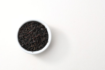 Fototapeta na wymiar Ceylon black tea. Top view, white background, isolated. Black tea on white background, isolated top view.