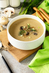 Vegan and diet healthy food. Mushroom soup puree with cream, champignons and vegetables.
