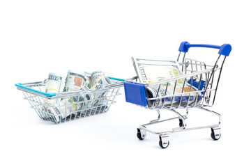 shopping cart with a shopping basket with one hundred dollar bills on a white background. isolate