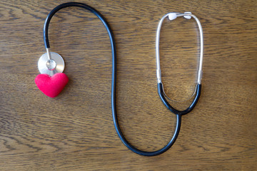 Stethoscope and red heart love shape