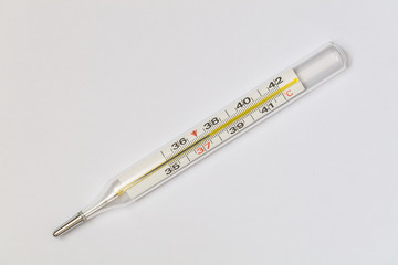 mercury thermometer on white background