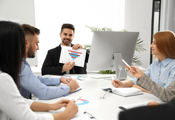 Fototapeta premium Professional business trainer working with people in office