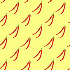 Seamless pattern of red hot chilli peppers on a yellow background. Minimal concept, isometric food texture.