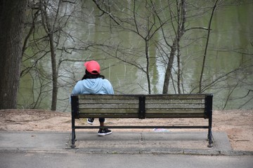 Woman relaxing on a park bench