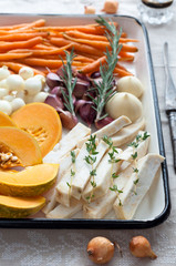 Raw Pumpkin, Baby Carrot, Onion, Garlic and Celeriac Ready for Cooking