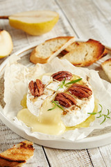 Cream cheese with mold Camembert with honey and nuts