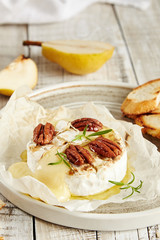 Cream cheese with mold Camembert with honey and nuts