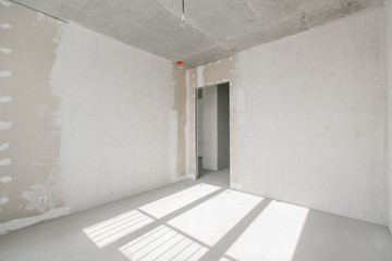 interior of the apartment without decoration in gray colors