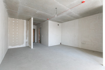 interior of the apartment without decoration in gray colors