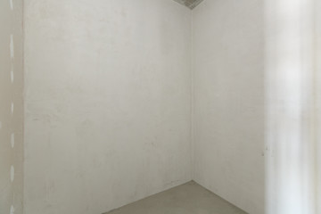 interior of the apartment without decoration in gray colors