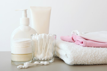 Fototapeta na wymiar Baby care products on the table. Daily baby care products for skin care, for bathing.