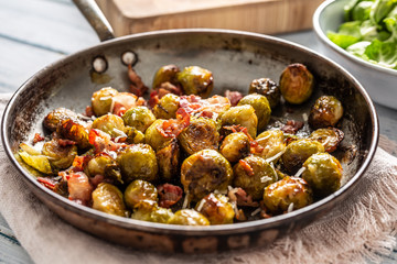 Fried brussels sprout with roasted bacon and parmesan cheese