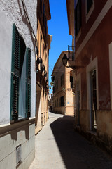 Ciutadela, Menorca / Spain - June 25, 2016: View of typical road and houses in Ciutadela, Menorca, Balearic Islands, Spain 