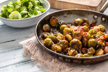 Fried brussels sprout with roasted bacon and parmesan cheese