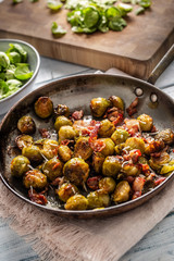 Fried brussels sprout with roasted bacon and parmesan cheese
