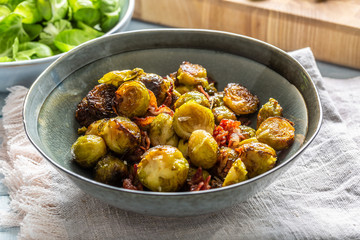 Fried brussels sprout with roasted bacon and parmesan cheese