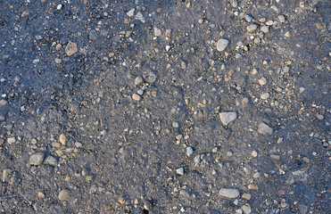 gray asphalt surround it made of stones