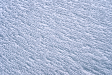 The texture of the snow after the wind in the mountains