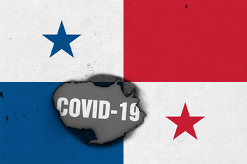 Flag of Panama with burned out hole showing Coronavirus name in it. 2019 - 2020 Novel Coronavirus (2019-nCoV) concept, for an outbreak occurs in the Panama.
