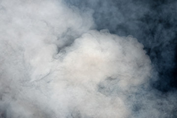 Close-up texture of dense smoke from a campfire