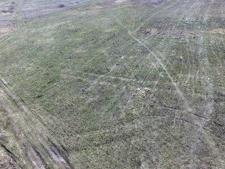 Eastern Europe landscape (drone image). Dirty road in the grass. Near Kiev,Ukraine