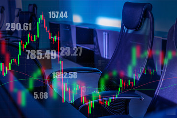 Stock quotes and charts on the background of office furniture. Work of a stock broker. The offer of services of the trader. Transactions on the securities market. Stock market. Financial advisory