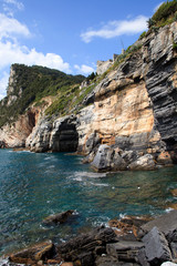 Portovenere ( SP ), Italy - April 15, 2017: Cliff around San Pietro Church, Portovenere gulf of Poets, Cinque Terre, La Spezia, Liguria, Italy