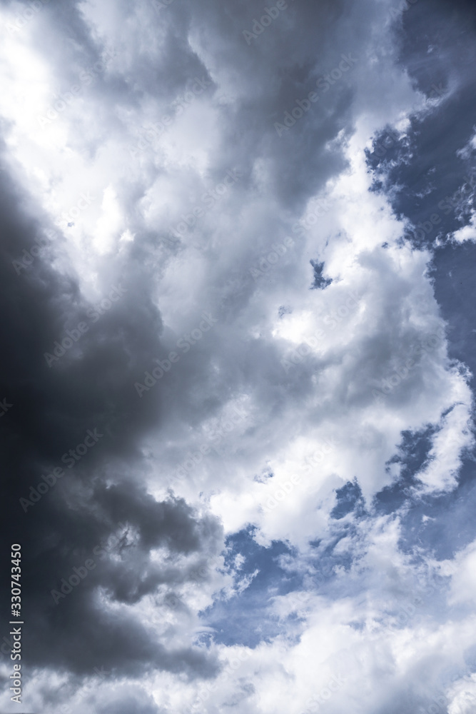 Wall mural terrible thunderclouds from the side of a plane. gloomy epic clouds. background image in a dark gray