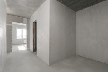 interior of the apartment without decoration in gray colors