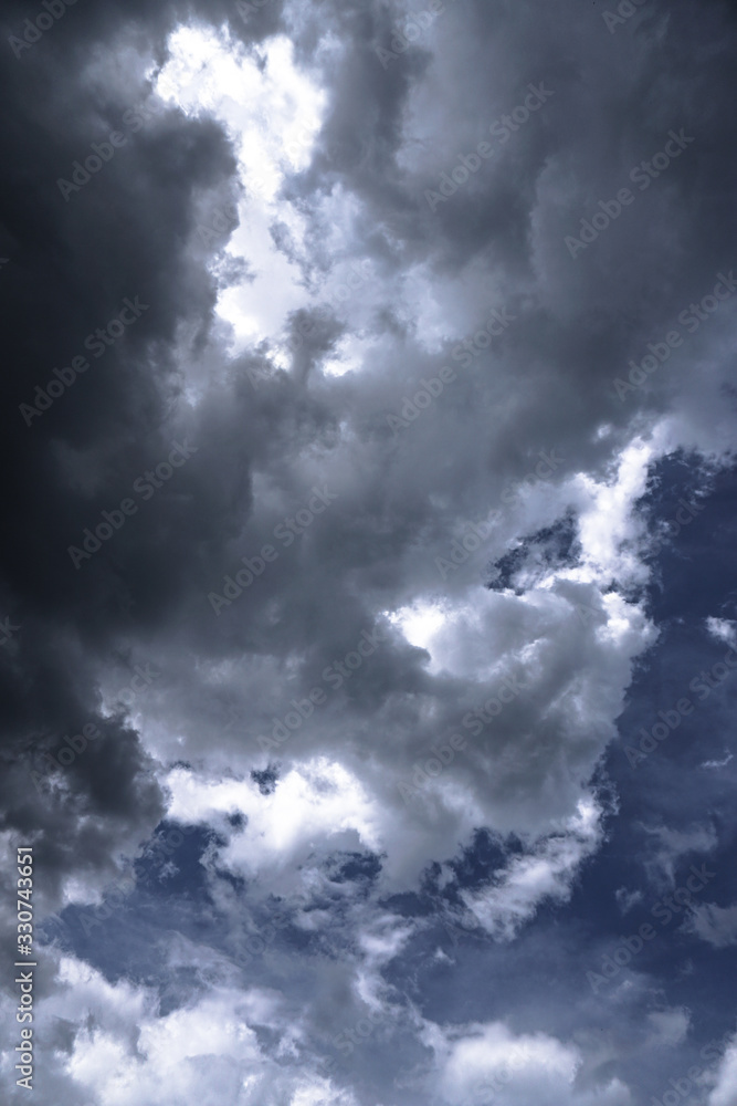 Wall mural terrible thunderclouds from the side of a plane. gloomy epic clouds. background image in a dark gray