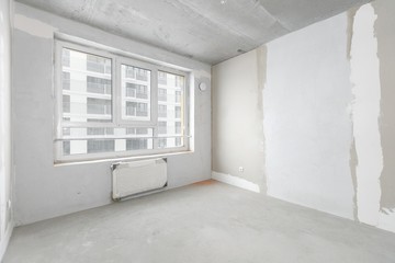 interior of the apartment without decoration in gray colors