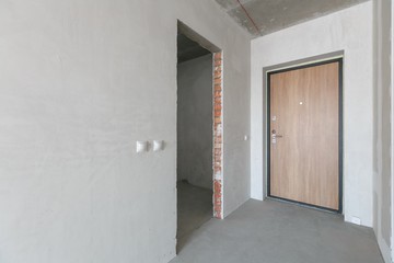 interior of the apartment without decoration in gray colors