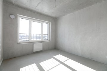 interior of the apartment without decoration in gray colors