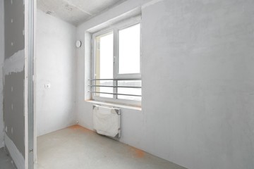 interior of the apartment without decoration in gray colors