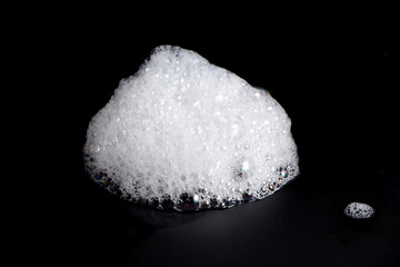 Abstract background white soapy foam texture. Shampoo foam with bubbles