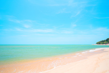 Beautiful tropical beach with blue sky and white clouds abstract texture background. Copy space of summer vacation and holiday business travel concept.