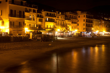 Obraz premium Alassio (SV), Italy - February 15, 2017: Alassio town at night, Riviera dei Fiori, Savona, Liguria, Italy.