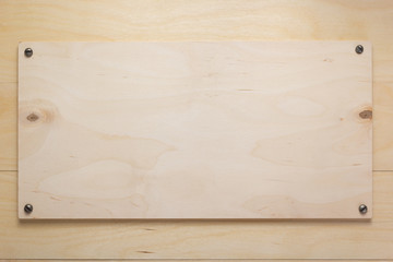 nameplate at wooden board plywood background