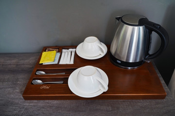 The teapot tea cups and the teabags from the hotel. Hotel tea combination