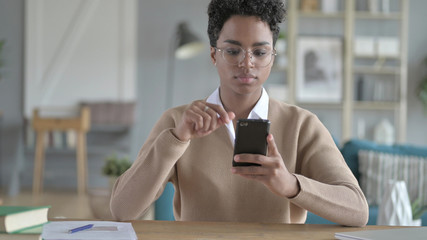 The Young African Girl Using Her Smart phone
